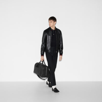 Gucci Medium travel bag with Jumbo GG